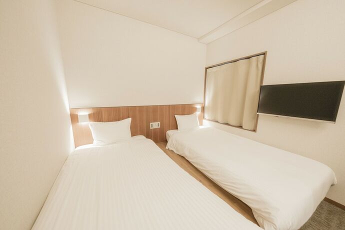 Imagen de la habitación del Hotel And Hakata. Foto 11