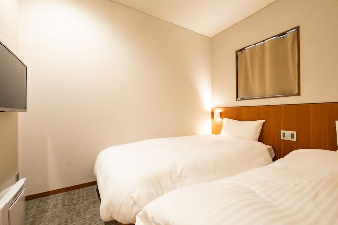 Imagen de la habitación del Hotel And Hakata. Foto 12