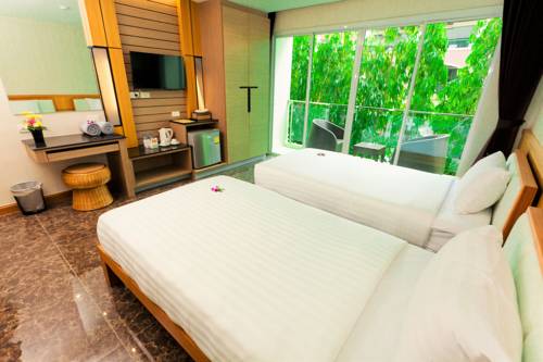 Imagen de la habitación del Hotel Anda Beachside. Foto 2