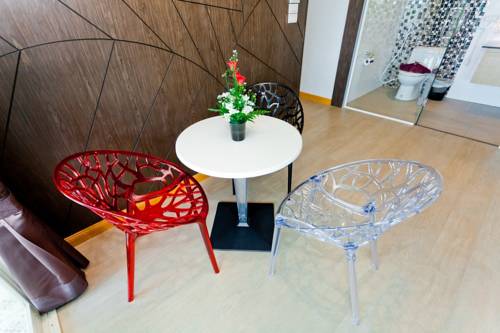 Imagen de la habitación del Hotel Anda Beachside. Foto 8