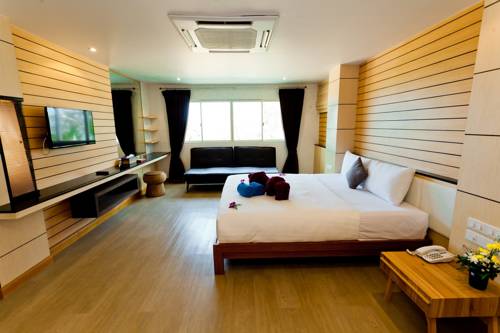 Imagen de la habitación del Hotel Anda Beachside. Foto 12