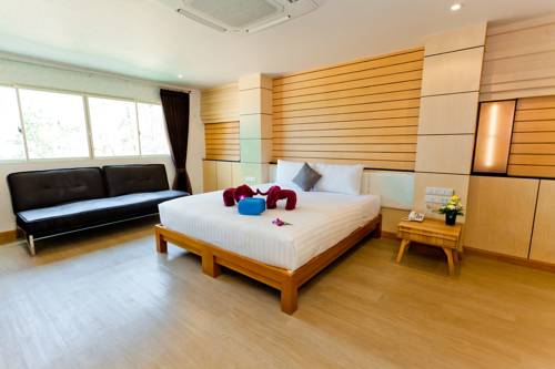 Imagen de la habitación del Hotel Anda Beachside. Foto 14