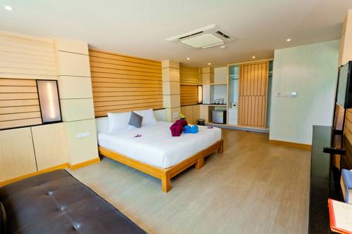 Imagen de la habitación del Hotel Anda Beachside. Foto 16