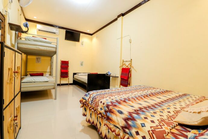 Imagen de la habitación del Hotel Andakara Homestay. Foto 4