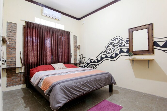 Imagen de la habitación del Hotel Andakara Homestay. Foto 6
