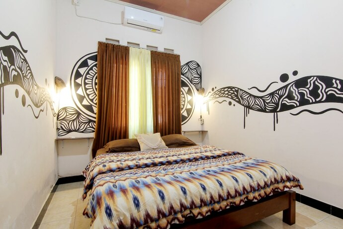 Imagen de la habitación del Hotel Andakara Homestay. Foto 7