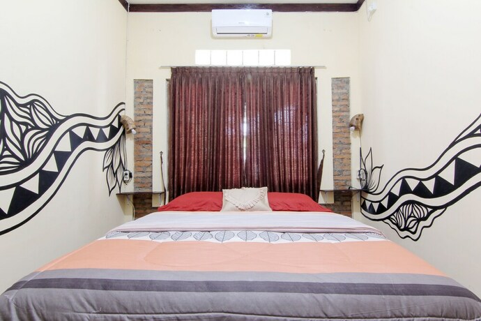 Imagen de la habitación del Hotel Andakara Homestay. Foto 8
