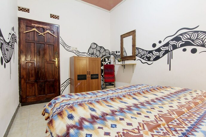 Imagen de la habitación del Hotel Andakara Homestay. Foto 9