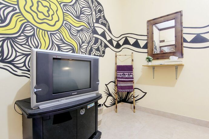 Imagen de la habitación del Hotel Andakara Homestay. Foto 10