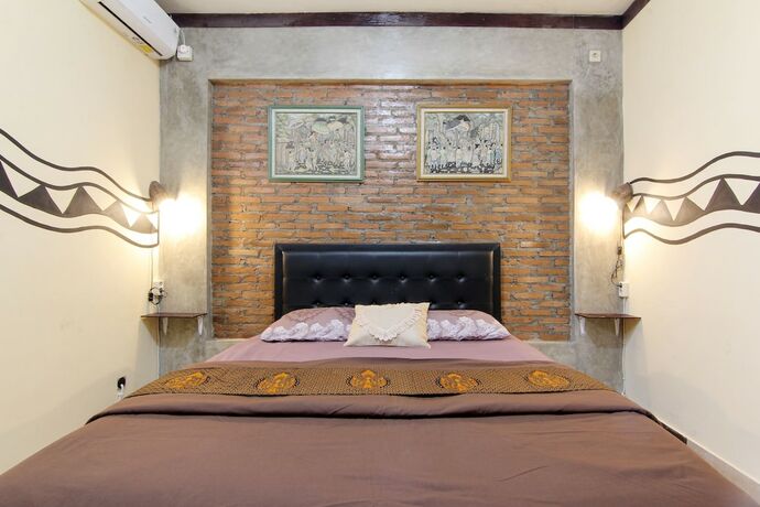 Imagen de la habitación del Hotel Andakara Homestay. Foto 11