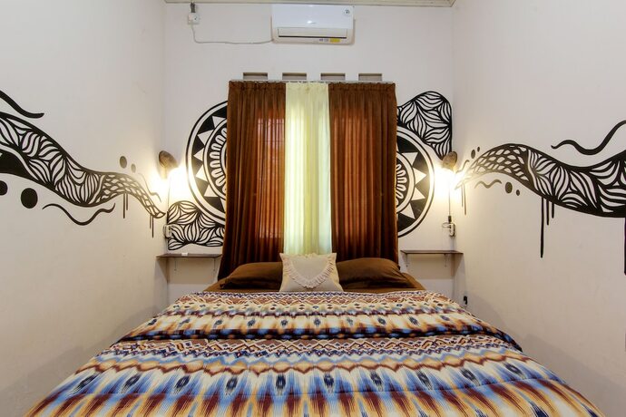 Imagen de la habitación del Hotel Andakara Homestay. Foto 12