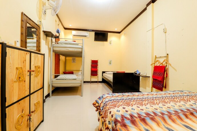 Imagen de la habitación del Hotel Andakara Homestay. Foto 13