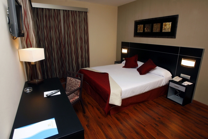 Imagen de la habitación del Hotel Andalussia. Foto 18