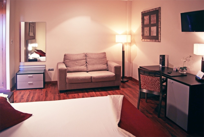 Imagen de la habitación del Hotel Andalussia. Foto 19