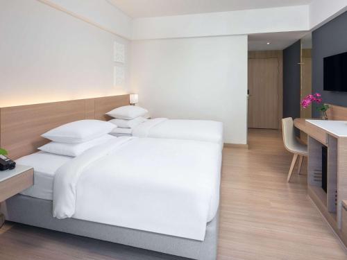 Imagen de la habitación del Hotel Andaman Beach Phuket - Handwritten Collection. Foto 15