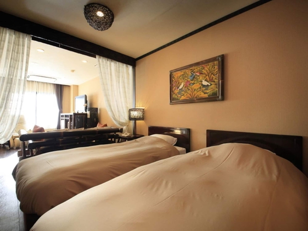 Imagen de la habitación del Hotel Andanomori Izu Ippekiko. Foto 7