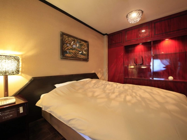 Imagen de la habitación del Hotel Andanomori Izu Ippekiko. Foto 9