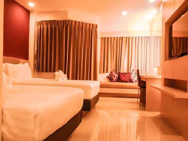 Imagen de la habitación del Hotel Andatel Grandé Patong Phuket. Foto 3