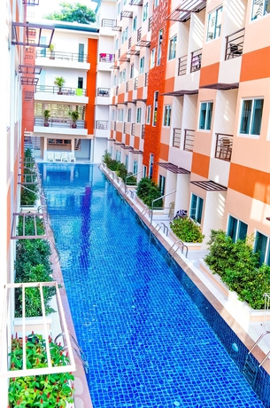 Imagen de la piscina del Hotel Andatel Grandé Patong Phuket. Foto 15