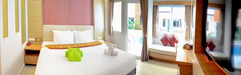 Imagen de la habitación del Hotel Andatel Grandé Patong Phuket. Foto 9
