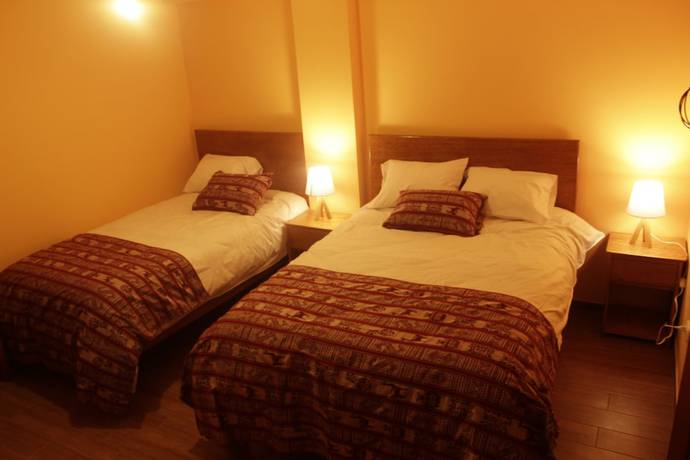 Imagen de la habitación del Hotel Andean Atoq Hostel. Foto 6