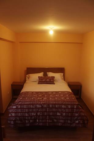 Imagen de la habitación del Hotel Andean Atoq Hostel. Foto 16