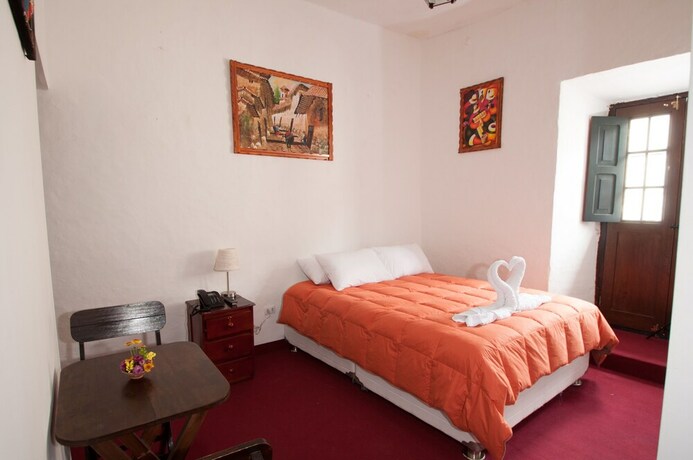 Imagen de la habitación del Hotel Andean Home. Foto 13