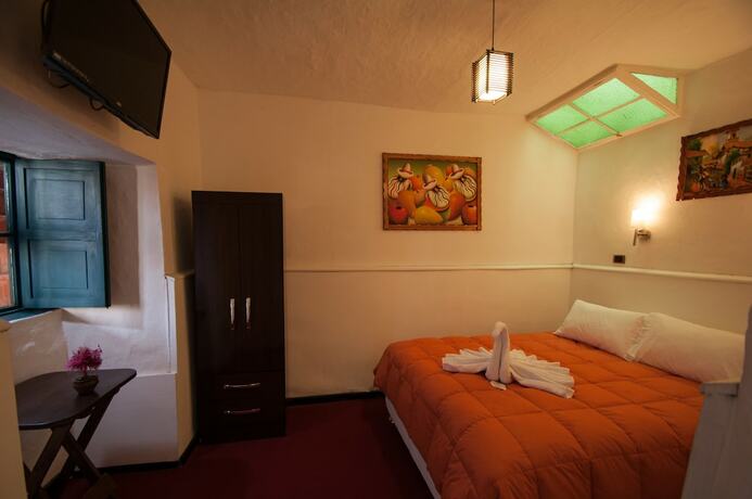 Imagen de la habitación del Hotel Andean Home. Foto 21