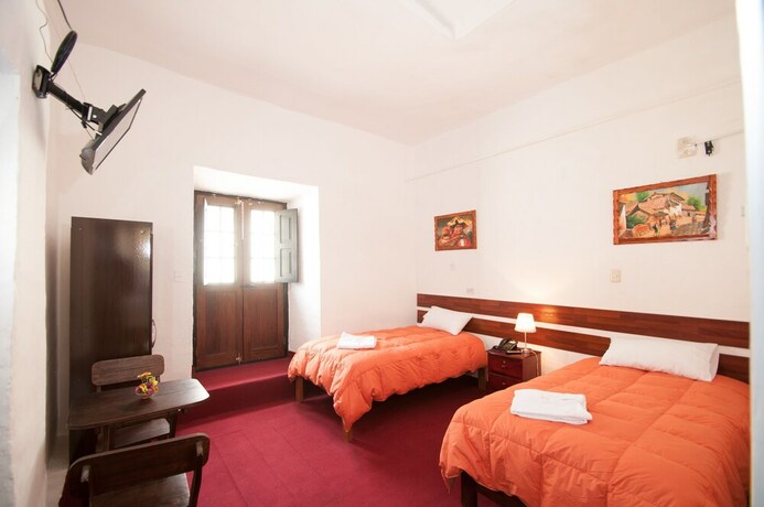 Imagen de la habitación del Hotel Andean Home. Foto 22