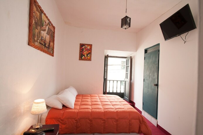 Imagen de la habitación del Hotel Andean Home. Foto 25