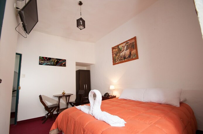 Imagen de la habitación del Hotel Andean Home. Foto 26
