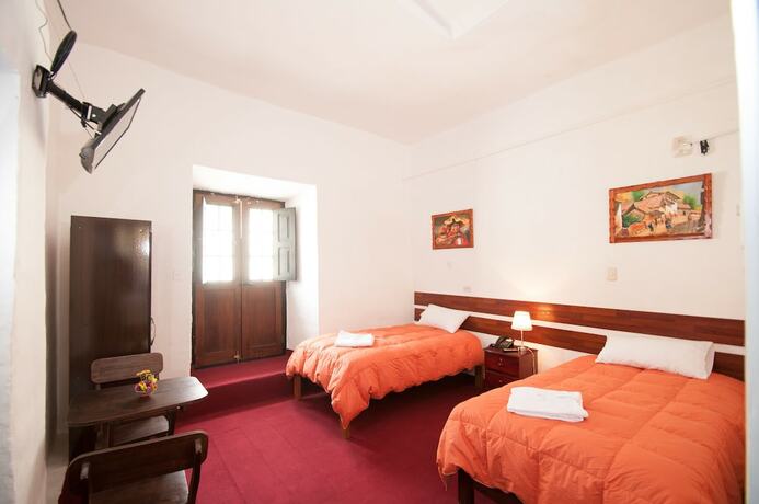 Imagen de la habitación del Hotel Andean Home. Foto 27