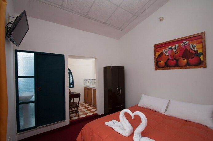 Imagen de la habitación del Hotel Andean Home. Foto 28