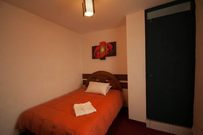 Imagen de la habitación del Hotel Andean Home. Foto 29