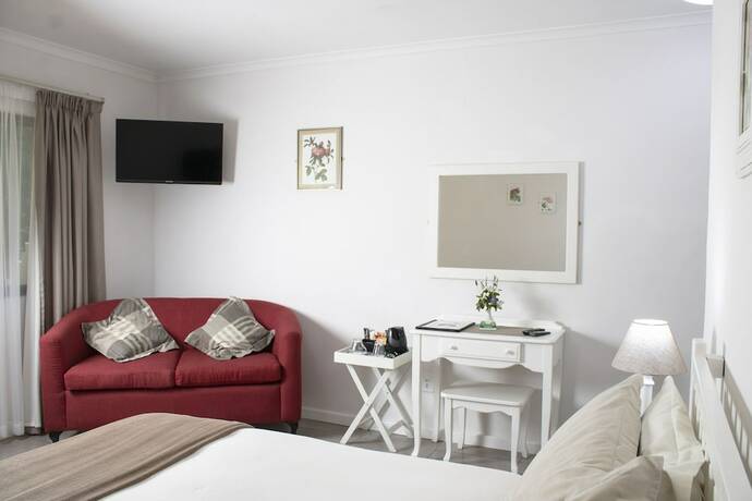 Imagen de la habitación del Hotel Andelomi Forest Lodge. Foto 17