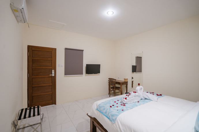 Imagen de la habitación del Hotel Andi Beach House. Foto 5
