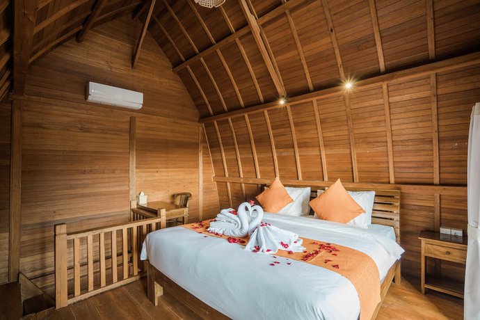 Imagen de la habitación del Hotel Andi Beach House. Foto 11