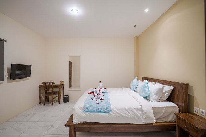 Imagen de la habitación del Hotel Andi Beach House. Foto 13