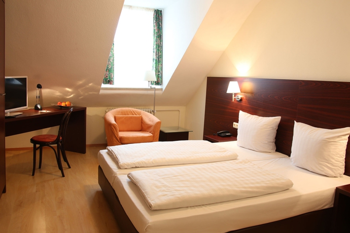 Imagen de la habitación del Hotel Andi Stadthotel. Foto 14