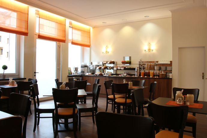 Imagen del bar/restaurante del Hotel Andi Stadthotel. Foto 4