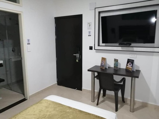 Imagen de la habitación del Hotel Andinos Plaza Florencia. Foto 10