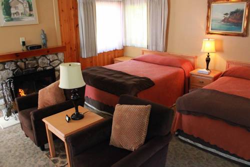Imagen de la habitación del Hotel Andril Fireplace Cottages. Foto 2