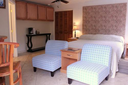 Imagen de la habitación del Hotel Andril Fireplace Cottages. Foto 4