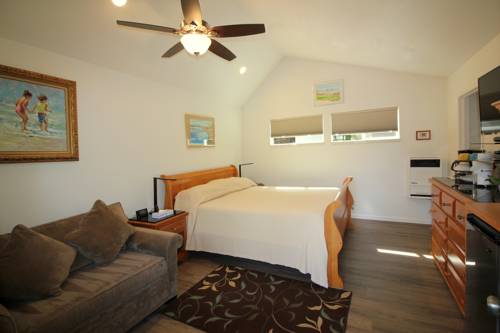 Imagen de la habitación del Hotel Andril Fireplace Cottages. Foto 6