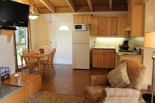 Imagen de la habitación del Hotel Andril Fireplace Cottages. Foto 12