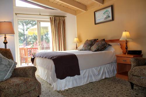 Imagen de la habitación del Hotel Andril Fireplace Cottages. Foto 13