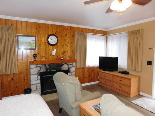 Imagen de la habitación del Hotel Andril Fireplace Cottages. Foto 15