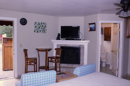 Imagen de la habitación del Hotel Andril Fireplace Cottages. Foto 16