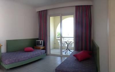 Imagen de la habitación del Hotel Andromeda Apartments. Foto 3