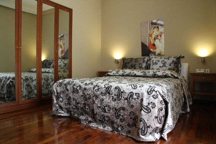 Imagen de la habitación del Hotel Andromeda Suites and Apartments. Foto 7